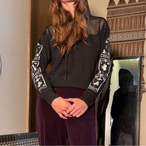 Black cropped hoodie with tarot cards on sleeves. Ace of Swords, Magician, Death